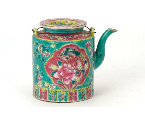 A TURQUOISE GROUND FAMILLE ROSE CYLINDRICAL TEAPOT Decorated with pink ground panels of phoenix and peonies, on a turquoise f