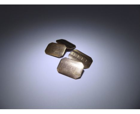 A Pair of 9 ct Gold Gentleman's Cuff Links, having engine turned engraving, approx 5.4 gms.