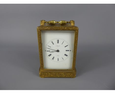 Late 19th Century French Brass Carriage Clock, the dial signed Auguste a Paris, contained within a maroon leather travelling 