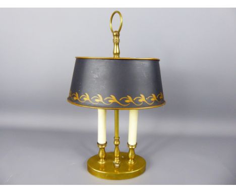 A Vintage Brass Bedside Light, with black/gold shade, approx 28 cms high.