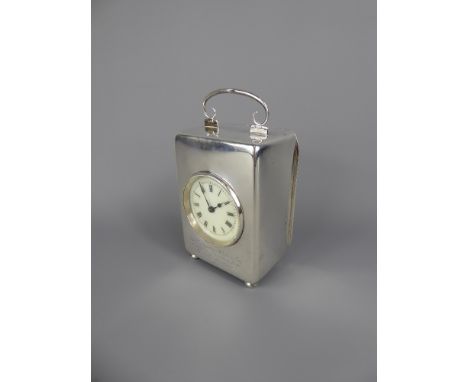 A Silver Cased French Carriage Clock, movement stamped S F, Chester hallmark, dated 1906, cream enamel face with Roman dial, 