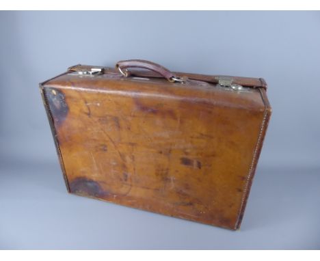 A Vintage Harrods Leather Suitcase.