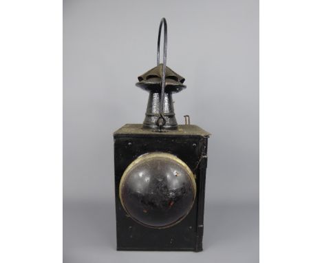 A Vintage Railway Signal Lamp with red and clear lenses.