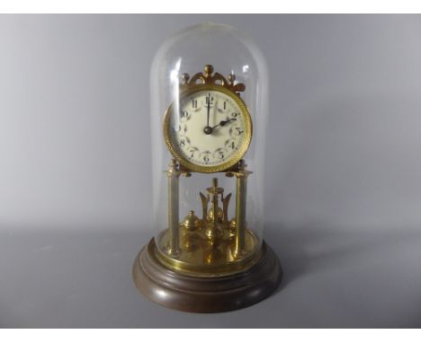 A Glass Domed Clock, the face decorated with garlands and flowers, approx 29 cms high. (af)