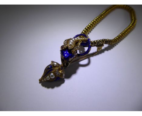 A Victorian 14 ct Yellow Gold, Diamond, Ruby and Blue Enamel Bracelet /Brooch, the serpent head set with rose cut dias and gr