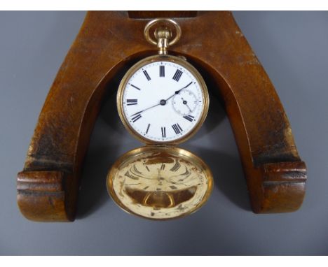 A Gentleman's 14 ct Gold Full Hunter Pocket Watch, having a white enamel face with minute dial, metal dust cover.