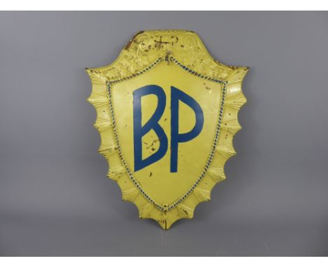 A Vintage Metal 'BP' Advertising Shield, blue letters on a yellow background, approx 14 x 44 cms.
