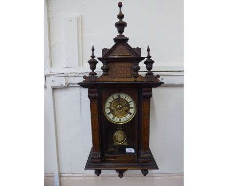 A Victorian Inlaid Wall Clock, with enamel face and Roman dial, the clock benefiting from decorative inlay, approx 56 x 110 x