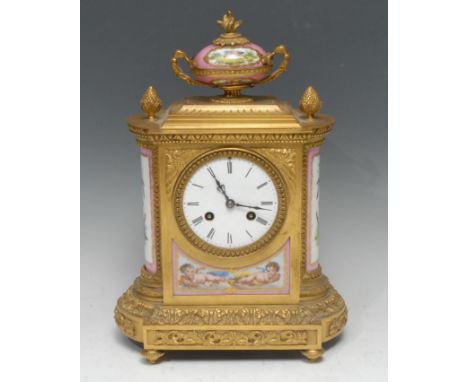 A 19th century French porcelain mounted ormolu mantel clock, 9.5cm circular enamel dial inscribed with Roman numerals, the ei