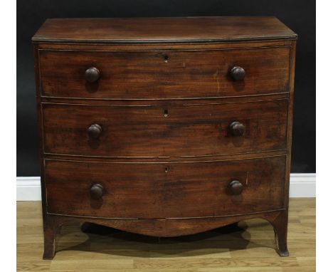 A George III mahogany bow-front chest, slightly oversailing top above three long graduated cockbeaded drawers, bun handles, s