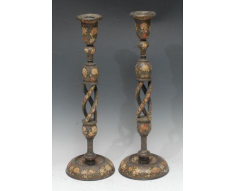 A pair of tall Kashmiri candlestick table lamps, each bell shaped sconce above a knopped open-twist pillar, dished turned bas