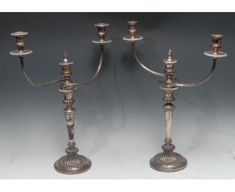 Matthew Boulton - a pair of George III Old Sheffield Plate half-fluted three-light two-branch table candelabra, campana sconc