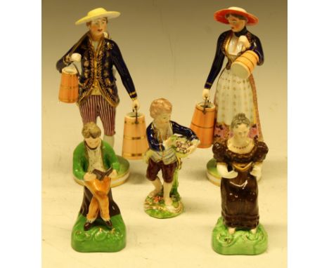 A pair of Derby figures, Milkman and Maid, both standing holding coopered pails, in colours, circular bases, 18cm high, crown