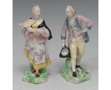 A rare pair of Derby Patch Mark Salutation figures, she stands with a fan, he taking a bow, both in colours, shaped bases app