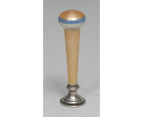 An early 20th century silver and guilloche enamel desk seal, decorated in tones of pale peach, the domed pommel outlined with