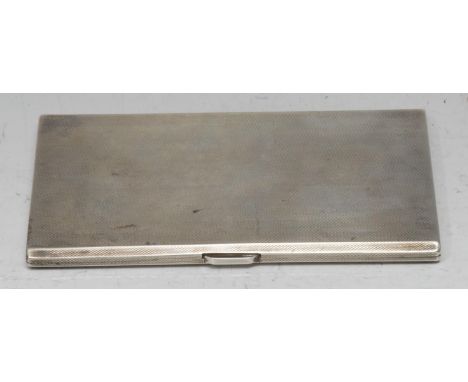 A George VI silver cigarette case, engine turned, gilt interior, 14cm long, Birmingham 1938, 8oz 