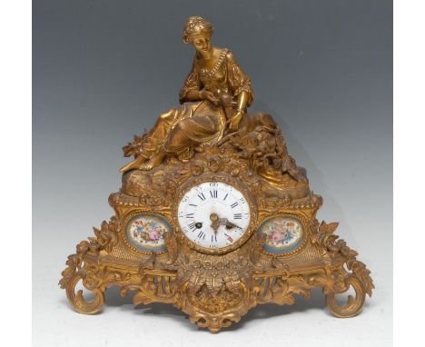 A 19th century French gilt-metal and porcelain mounted mantel clock, 6.5cm circular enamel dial inscribed Le Roy &amp; Fils, 