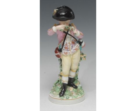 A Derby Patch Mark figure, French Season, Allegorical of Spring, he stands wearing a black brimmed hat, holding a garland, gi