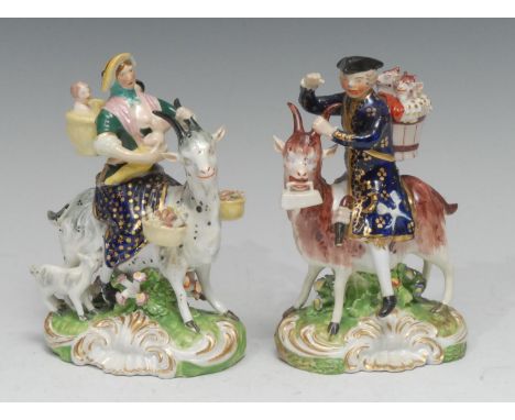 A pair of Derby figures, The Welch Tailor and Wife, he seated astride a goat, he wearing a tricorn hat with a pannier on his 
