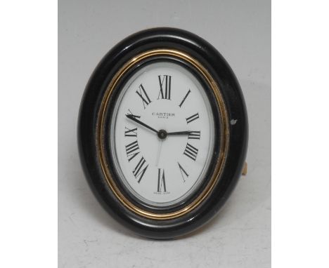 Cartier - a Swiss oval strut easel desk timepiece, the 6cm x 4cm oval clock dial inscribed Cartier, Paris, Roman numerals, ke
