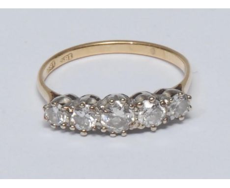 A diamond quintet line ring, linear set with five graduated old brilliant cut diamonds, total estimated diamond weight approx