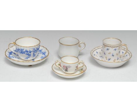 A Sèvres hard-paste coffee can and saucer (gobelet Litron et soucoupe), of the third size, painted with blue flowers and gilt