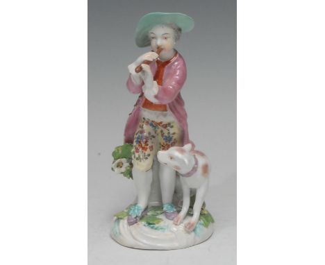 A Derby Patch Mark figure, of a shepherd playing a reed pipe, taken from a Meissen original by JJ Kandler, he stands wearing 