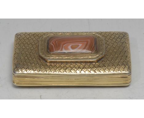 A George III agate mounted silver-gilt rectangular snuff box, hinged cover centred by a canted reserve, on a ground of diaper