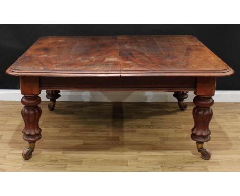 A William IV mahogany extending dining table, rounded rectangular top with moulded edge, no additional leaves, turned lotus l