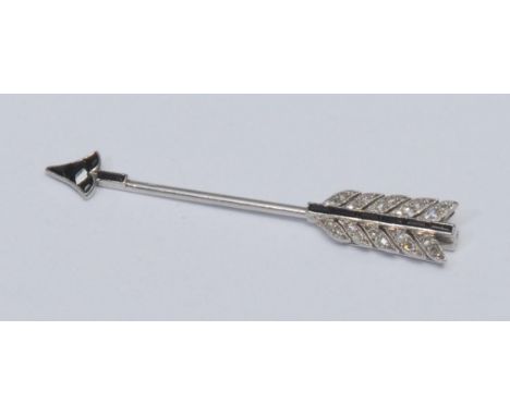 Cartier - a sapphire and diamond jabot pin brooch, as an arrow pave set with baguette and calibre cut sapphires to the arrow 