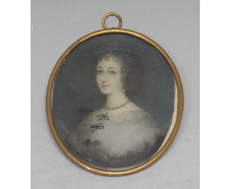 French School (19th century), a portrait miniature, of a lady wearing a pearl necklace, watercolour on ivorine, oval 8cm x 6.
