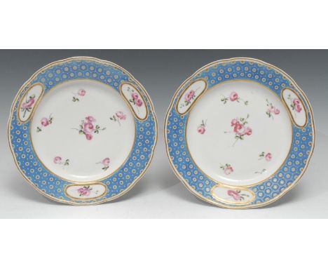 A pair of Derby shaped circular plates,  from the Duke of Northumberland service, painted by Edward Withers, in the Sevres st