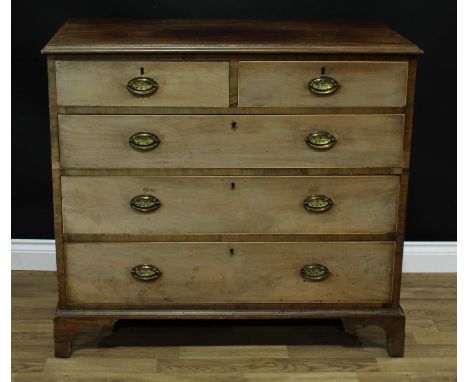 A George III mahogany chest, rectangular top above two short and three long graduated drawers, swing handles, thistle-pressed