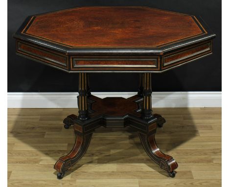 A Victorian rosewood crossbanded amboyna and ebonised centre table, well-figured octagonal top above a deep frieze mounted wi