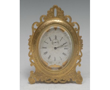 A 19th century gilt brass strutt easel timepiece, in the manner of Thomas Cole, 5.5cm oval silvered clock dial inscribed with