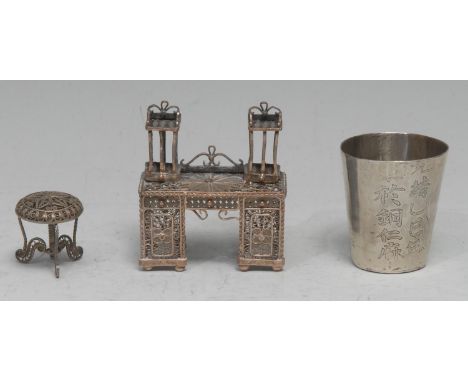 A Chinese silver tapered cylindrical beaker, engraved with verse, 4.5cm high, early 20th century; a filigree toy miniature mo