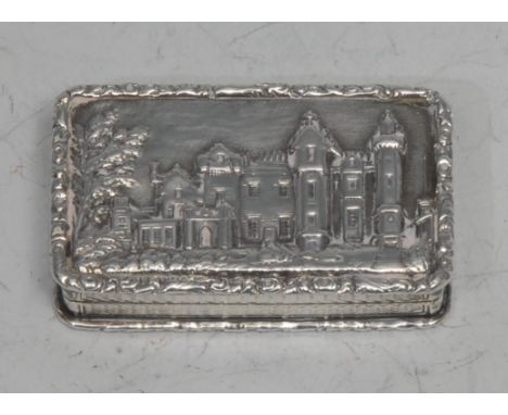 A William IV silver rounded rectangular castle top vinaigrette, the hinged cover in relief with a view of Abbotsford House, M