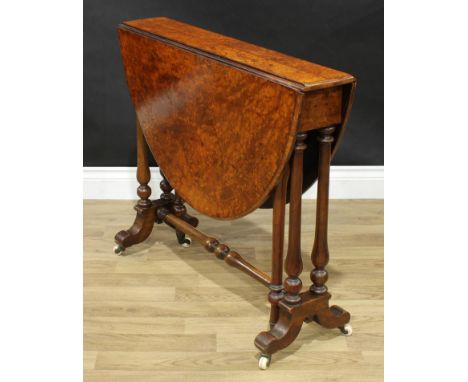 A Victorian walnut and marquetry Sutherland table, oval top with fall leaves, inlaid with scrolling foliage and intersecting 