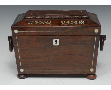 A Victorian rosewood sarcophagus shaped two section tea caddy, inlaid with mother-of-pearl, loose ring handles, bun feet, 20c