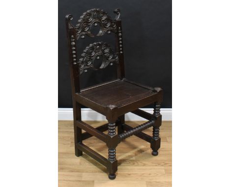 Frank Pratt of Derby - a 17th century style oak 'Derbyshire' chair, of Charles II design, shaped cresting rail carved with an