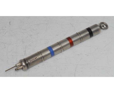 An early 20th century silver and enamel patent three-section triple colour propelling pencil, the triple-section barrel strip