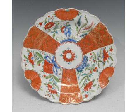 A rare Worcester Scarlet Japan pattern shaped circular plate, unusually painted in onglaze blue, probably in the Giles atelie