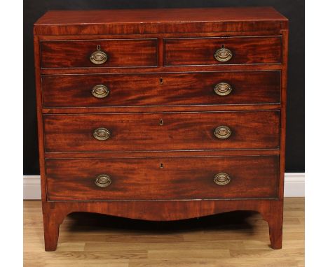 A Regency mahogany chest, flush rectangular top above two short and three long graduated cockbeaded drawers, pressed brass ov