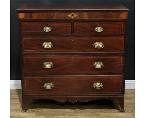 A Regency mahogany chest, slightly oversailing rectangular top above a shallow long, two short and three long graduated drawe