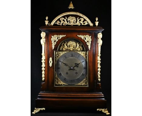 A George II style gilt metal mounted mahogany bracket clock, 18.5cm arched brass dial with silvered chapter ring inscribed wi