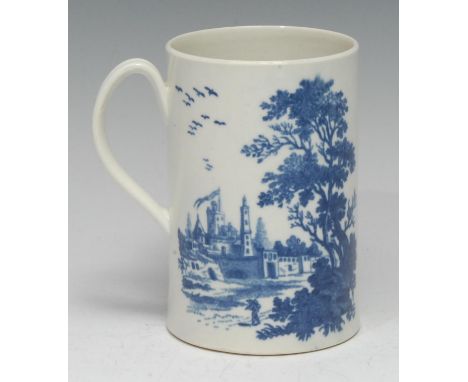 A Worcester European Landscapes pattern mug, printed in underglaze blue, scroll handle, 12cm high, crescent mark, c. 1775 