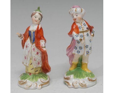 A pair of Derby Patch Mark figures, Turk and Companion, both in dancing poses, he wearing a fur-trimmed turban and long rode 