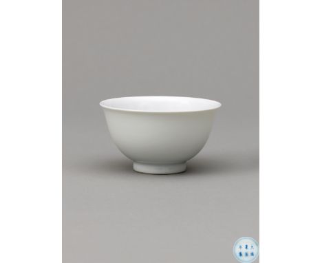 An elegantly proportioned deep, round cup with a slightly flared rim and with a shallow foot, decorated with a pleasing, lust