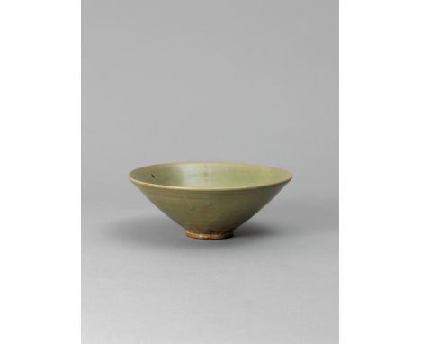 An elegant Yaozhou celadon bowl, Northern Song dynasty, of rounded conical form with widely flared sides, the interior divide