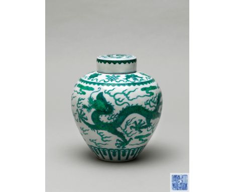 Decorated in underglaze blue line under soft green enamels, against the white glazed ground, with two five-clawed dragons str